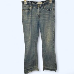 Levi's blue bootcut jeans with frayed hem